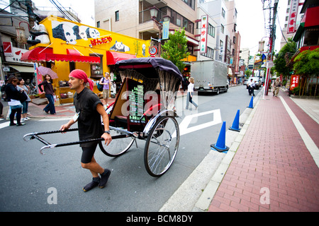 Rickshaw worker in chinatown yokohama, japan Stock Photo