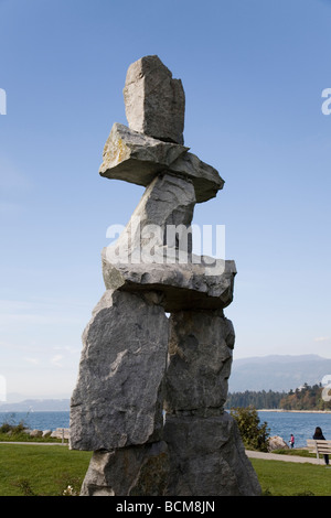 Inukshuk at English Bay Beach Vancouver British Columbia facing west on a summer afternoon Stock Photo