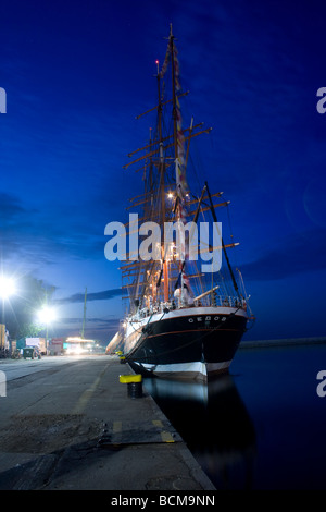 Night shot from the beginning of Tall Ships Races 2009 in Gdynia. Russian Class A ship, Sedov. Stock Photo