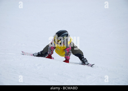 young boy in ski gear on mountain slope Zillertal Tirol Stock Photo