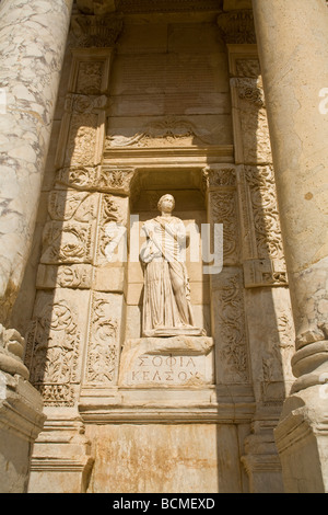 Carved statue on outside facade of Celsus Library Stock Photo