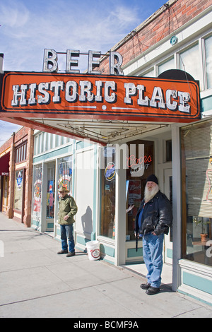 Local man in leather jacket stands outside saloon on Ogden's historic 25th Street. Stock Photo