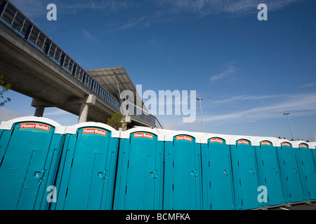 Row of Honey Bucket Portable Restrooms at the Tukwila Station Seattle Link Light rail Opening Day Stock Photo