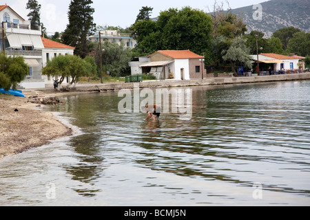 Woman Bathing in the Thermi Water Stock Photo