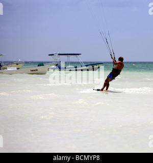 Man kite surfing on Holbox island, Quintana Roo, Yucatán Peninsula, Mexico, a unique Mexican destination in the Yucatan Channel, Stock Photo