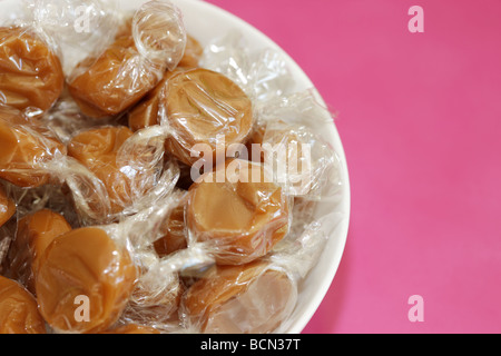 Bowl Of Hard Traditional Chewy Dairy Toffee Sweets Confectionery With No People Stock Photo