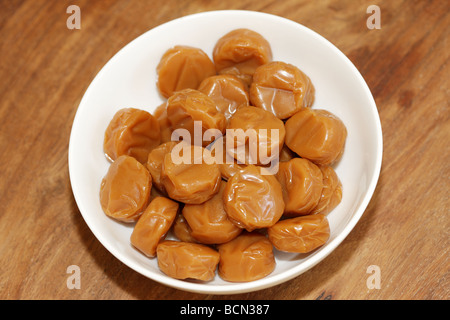 Bowl Of Hard Traditional Chewy Dairy Toffee Sweets Confectionery With No People Stock Photo