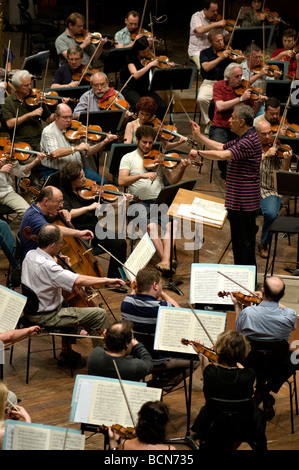 Indian conductor Zubin Mehta rehearses the Israel Philharmonic Orchestra in Auditorium Mann Tel Aviv Israel Stock Photo