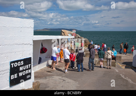 Swimmers in Sandycove Forty Foot bathing area Dun Laoghaire near Dublin Ireland Eire Irish Republic Europe Stock Photo