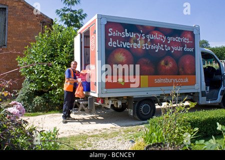 Driver delivering Sainsburys groceries Mickleton UK Stock Photo