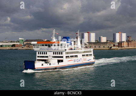 The Wightlink Isle of Wight Ferry St Helen leaving Portsmouth Harbour in early morning sunlight Stock Photo