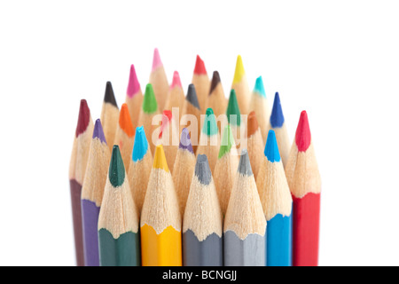 Assortment of coloured pencils isolated on white background Shallow depth of field Stock Photo