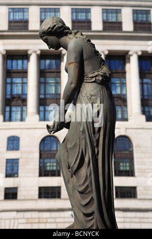 Fountain by Wills Bros with a woman sculpture  outside Unilever Headquarters 100 Victoria Embankment City of London England UK Stock Photo