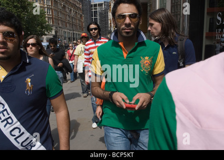 Middle Eastern tourists in Knightsbridge London. Young men wearing Ralph Lauren designer Polo Shirts 2009 2000s UK HOMER SYKES Stock Photo