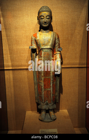 Exquisite gold gilded statue of Buddha from North Qi period, Capital Museum, Beijing, China Stock Photo