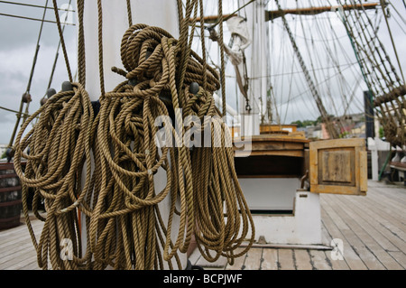 Rope rigging on the deck of an old fashioned tall ship Stock Photo