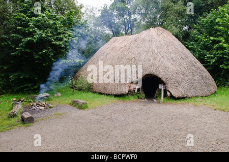 Stone age thatched house in the Irish National Heritage Park, County ...