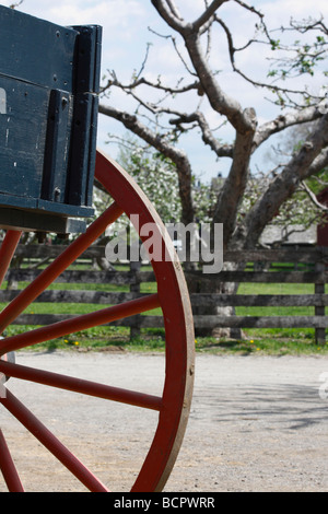 Rural farming carriage in Michigan MI countryside farmland old vintage fashioned farm scenes photos picture image vertical format in USA US hi-res Stock Photo