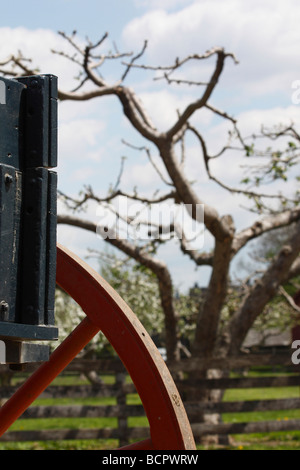 Old wooden rural carriage n Michigan MI  USA US rural rustic countryside country side blurry blurred background nobody vertical hi-res Stock Photo