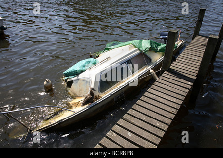 Sinking boat. Stock Photo