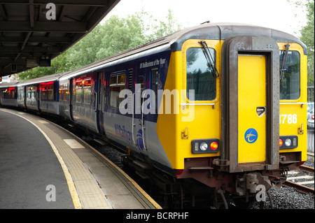 Northern Ireland Railways train sitting in Belfast Central Station waiting to leave Stock Photo
