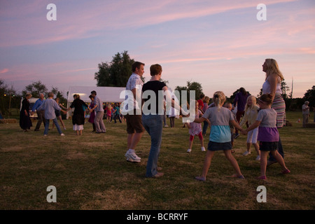 The annual field dance at Rendham, Suffolk follows the village fete. Stock Photo