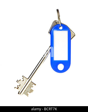 Key with color trinket In trinket a white empty label for records Stock Photo