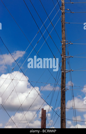 Power lines and guy wires on a utility pole Stock Photo