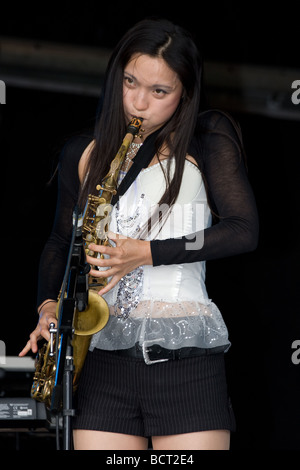 japanese oriental woman saxophonist jazz ska band Lambeth Country Show, Brockwell Park, Tulse Hill, London, Stock Photo