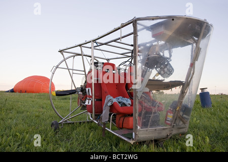 close up shot of blimp gondola standing on green grass Stock Photo
