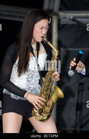 japanese oriental woman saxophonist jazz ska band Lambeth Country Show, Brockwell Park, Tulse Hill, London, England, UK, Europe Stock Photo