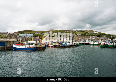Fishing boats moored in Stromness Harbour on the Orkney Mainland in Scotland
