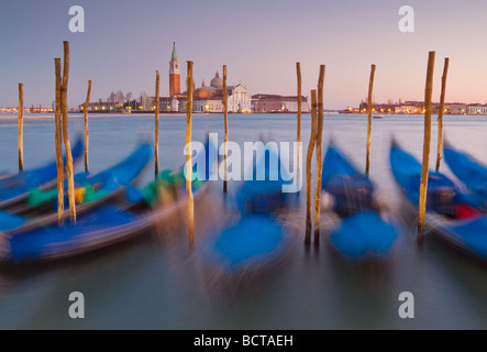 Venice Gondolas moored at night in the Bacino di san Marco, St Mark's Basin, waterfront, Venice, Italy, EU, Europe