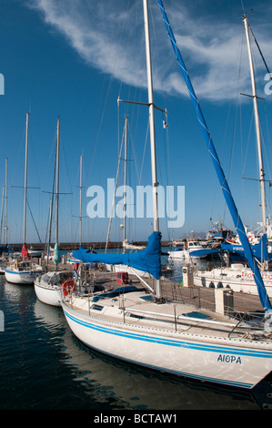 Yachts moored on the jetty at the Venetian harbour in Chania, Crete, Greece. Stock Photo