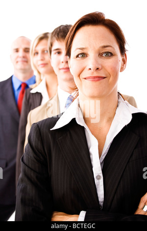Successful team, two men and two women, standing behind each other Stock Photo