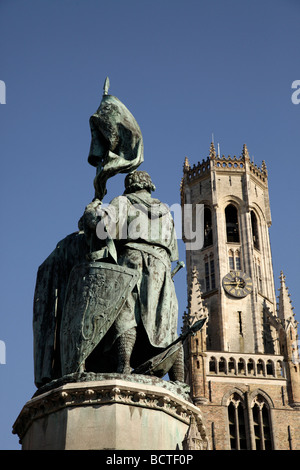 Statue of the Bruges folk heroes Jan Breydel and Pieter de Coninck, on the market square Grote Markt, in the historic centre of Stock Photo