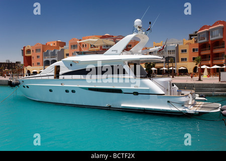 Private yacht in front of houses in the marina, Hurghada, Egypt, Red Sea, Africa Stock Photo