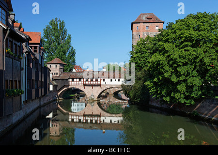 Executioner's home with half-timbered building, bridge building with two arches, small fortified tower and high water tower, Pe Stock Photo