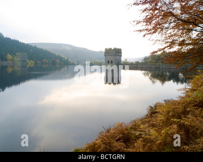 Early morning view of the Dam at Ladybower Reservoir reflected in the water, Derbyshire England UK Stock Photo