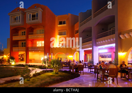 Street restaurant with people, evening, illuminated, marina, Hurghada, Egypt, Red Sea, Africa Stock Photo