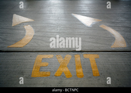 exit sign arrows parking garage Stock Photo