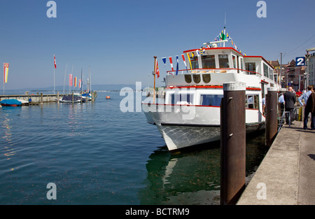 Boat loading passengers in the Rorschach Harbour on lake Constance Stock Photo