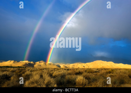 Double rainbow over Eastern Sierra Mountains near Bishop California Stock Photo