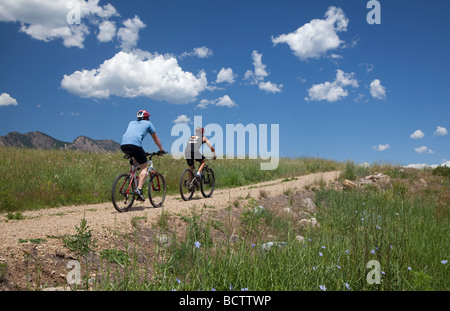 Boulder Colorado Mountain bike riders on a trail in the foothills of the Rocky Mountains Stock Photo