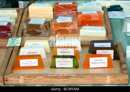 Blocks of 'vegetable glycerine' soaps on a market stall  tray Stock Photo
