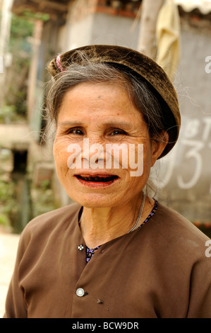 Vietnamese woman with black teeth from chewing betel nuts in Hanoi ...