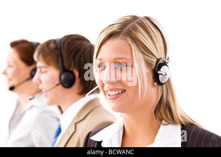 Three people with headsets Stock Photo