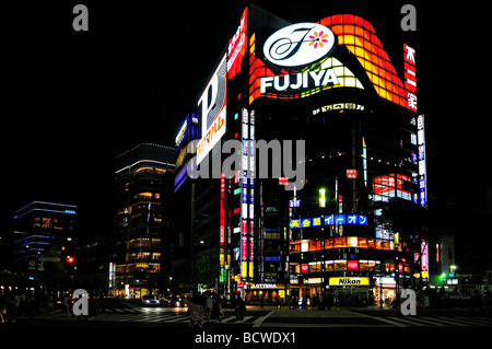 Colourful shop fronts and advertisements screens in Ginza district Tokyo Japan