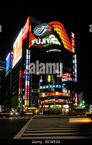 Colourful shop fronts and advertisements screens in Ginza district Tokyo Japan