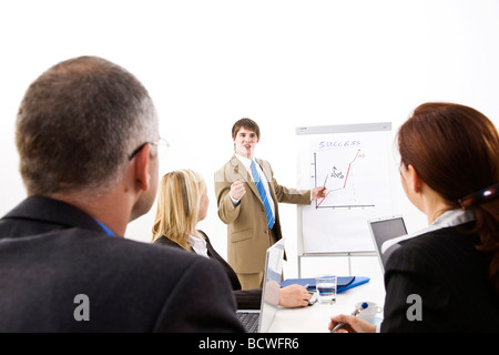 Business meeting with a flipchart Stock Photo